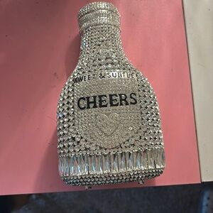 Champagne bottle clutch